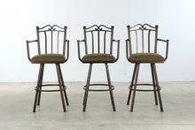 Load image into Gallery viewer, Set of Three Metal Swivel Bar Stools with Arms and Upholstered Seats
