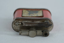 Load image into Gallery viewer, Girey Lift Arm Petrol Lighter, Red Enamel with Seated Figure &amp; Lamp Motif
