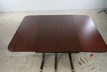 Load image into Gallery viewer, Vintage Mahogany Drop Leaf Dining Table with Triple Pedestal Brass Capped Base
