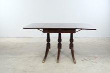 Load image into Gallery viewer, Vintage Mahogany Drop Leaf Dining Table with Triple Pedestal Brass Capped Base
