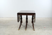 Load image into Gallery viewer, Vintage Mahogany Drop Leaf Dining Table with Triple Pedestal Brass Capped Base
