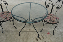 Load image into Gallery viewer, Wrought Iron Glass Top Bistro Table and Two Floral Side Chairs

