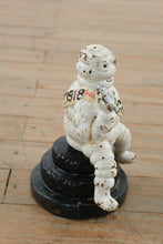 Load image into Gallery viewer, Antique Michelin Man Cast Iron Coin Bank Detroit 1918 Advertising Figure
