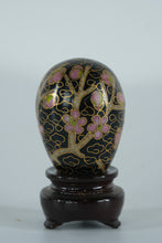 Load image into Gallery viewer, Miniature Cloisonné Egg with Pink Plum Blossom Design – Black Enamel Floral Art on Stand
