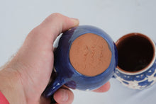 Load image into Gallery viewer, Pair Mexican Hand Painted Blue White Floral Pottery Mugs Terracotta Clay
