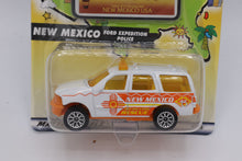 Load image into Gallery viewer, Matchbox Across America 50th Birthday Series – New Mexico Ford Expedition Police (NM 047)
