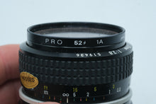 Load image into Gallery viewer, Nikon Nikkor 28mm F2 8 AI Manual Focus Wide Angle Lens 519436 With Filter
