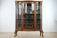 Load image into Gallery viewer, Antique Tiger Oak Curved Glass Curio Cabinet with Leaded Glass and Claw Feet
