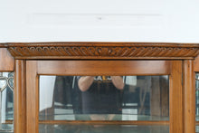 Load image into Gallery viewer, Antique Tiger Oak Curved Glass Curio Cabinet with Leaded Glass and Claw Feet
