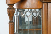 Load image into Gallery viewer, Antique Tiger Oak Curved Glass Curio Cabinet with Leaded Glass and Claw Feet
