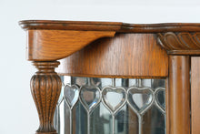 Load image into Gallery viewer, Antique Tiger Oak Curved Glass Curio Cabinet with Leaded Glass and Claw Feet
