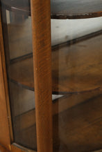 Load image into Gallery viewer, Antique Tiger Oak Curved Glass Curio Cabinet with Leaded Glass and Claw Feet
