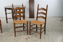 Load image into Gallery viewer, Vintage Solid Oak Round Extension Dining Table with Four Rush Seat Ladderback Chairs

