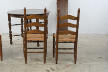 Load image into Gallery viewer, Vintage Solid Oak Round Extension Dining Table with Four Rush Seat Ladderback Chairs
