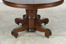 Load image into Gallery viewer, Antique Victorian Oak Round Pedestal Dining Table on Casters
