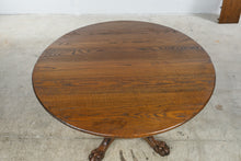 Load image into Gallery viewer, Traditional Oak Round Pedestal Dining Table with Claw Feet and 12-Inch Extension Leaf

