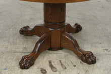 Load image into Gallery viewer, Traditional Oak Round Pedestal Dining Table with Claw Feet and 12-Inch Extension Leaf
