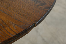 Load image into Gallery viewer, Traditional Oak Round Pedestal Dining Table with Claw Feet and 12-Inch Extension Leaf
