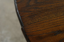Load image into Gallery viewer, Traditional Oak Round Pedestal Dining Table with Claw Feet and 12-Inch Extension Leaf
