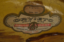 Load image into Gallery viewer, Vintage Italian Orvieto Wine Bottle – Fish Shaped Amber Glass with Label
