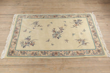 Load image into Gallery viewer, Papillon Hand Woven Wool Rug - 68&quot; x 112&quot;
