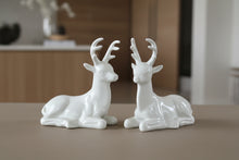 Load image into Gallery viewer, Vintage White Porcelain Deer Figurines Pair Reclining Bucks 8 Inch
