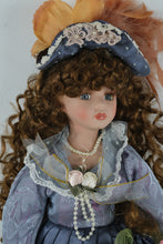 Load image into Gallery viewer, Victorian-Style Porcelain Collectible Doll in Lavender &amp; Navy Gown w/ Feathered Hat – 18" Display Doll
