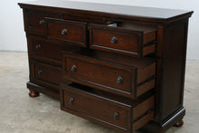 Load image into Gallery viewer, Ashley Porter 7-Drawer Dresser in Rustic Brown
