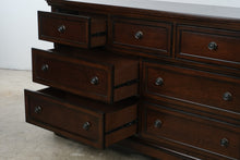 Load image into Gallery viewer, Ashley Porter 7-Drawer Dresser in Rustic Brown
