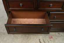 Load image into Gallery viewer, Ashley Porter 7-Drawer Dresser in Rustic Brown
