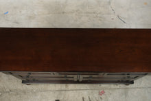 Load image into Gallery viewer, Ashley Porter 7-Drawer Dresser in Rustic Brown
