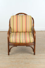 Load image into Gallery viewer, Rattan Lounge Chair with Vibrant Striped Upholstery

