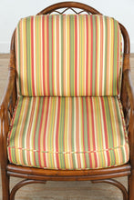 Load image into Gallery viewer, Rattan Lounge Chair with Vibrant Striped Upholstery
