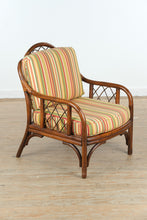 Load image into Gallery viewer, Rattan Lounge Chair with Vibrant Striped Upholstery
