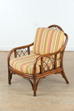 Load image into Gallery viewer, Rattan Lounge Chair with Vibrant Striped Upholstery

