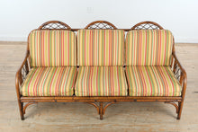 Load image into Gallery viewer, Rattan Sofa with Bright Striped Upholstery and Matching Accent Pillows

