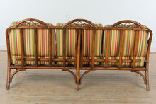Load image into Gallery viewer, Rattan Sofa with Bright Striped Upholstery and Matching Accent Pillows
