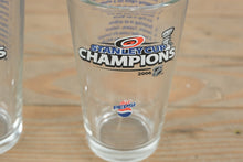 Load image into Gallery viewer, 2006 Stanley Cup Champions Pint Glasses – Carolina Hurricanes × Diet Pepsi (Set of 2)
