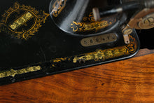 Load image into Gallery viewer, Antique Treadle Sewing Machine in Inlaid Wood Cabinet
