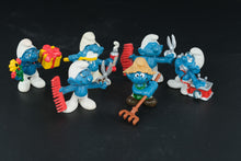 Load image into Gallery viewer, Vintage Smurfs Lot – 1970s–1980s Schleich Peyo Figures – Barber, Farmer, Gift Giver &amp; More (Set of 6)
