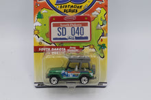 Load image into Gallery viewer, Matchbox Across America 50th Birthday Series – South Dakota Jeep Wrangler “Mount Rushmore Adventure” (SD 040)
