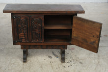 Load image into Gallery viewer, Spanish Colonial Style Carved Wood Two-Door Cabinet with Figural Relief Panels
