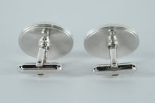Load image into Gallery viewer, Modernist Black &amp; Silver Oval Cufflinks – Star &amp; Wave Design
