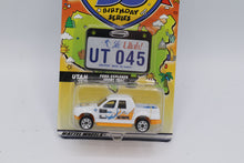 Load image into Gallery viewer, Matchbox Across America 50th Birthday Series – Utah Ford Explorer Sport Trac “Ski Patrol” (UT 045)
