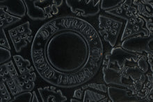 Load image into Gallery viewer, Vintage Black Leather Upholstered Bench with Embossed Hotel Crest and Wood Base, Raleigh NC
