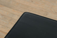 Load image into Gallery viewer, Vintage Black Vinyl Upholstered Bench with Velvet Cloak Raleigh NC Crest and Painted Wood Base
