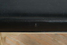 Load image into Gallery viewer, Vintage Black Vinyl Upholstered Bench with Velvet Cloak Raleigh NC Crest and Painted Wood Base
