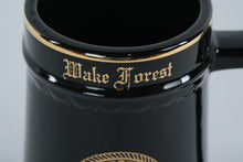 Load image into Gallery viewer, Wake Forest College Stein Mug Black Gold Crest Ceramic Tankard Vintage
