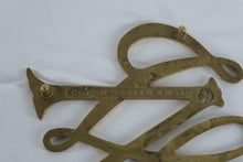 Load image into Gallery viewer, Williamsburg William &amp; Mary Solid Brass Trivet – Colonial Revival Monogram Design – Footed Decorative Hot Plate
