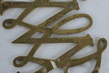 Load image into Gallery viewer, Williamsburg William &amp; Mary Solid Brass Trivet – Colonial Revival Monogram Design – Footed Decorative Hot Plate
